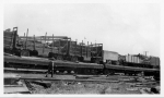 Con T. Kennedy loaded flats in a rail yard...early 1900's.jpg
