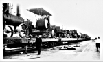 Con T. Kennedy unloading the train...early 1900's.jpg