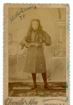 Young girl with snakes on the Walter L. Main Shows 1891.jpg