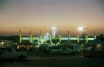 Johnny's United front gate at night...1960's.jpg