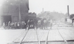 Unloading the Rubin & Cherry flats...early 1900's.jpg