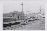 Clyde Mulligan on a cat unloading the Cetlin Wilson Train...1952.JPG