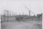 The rides going up on the Cetlin Wilson Shows Midway....1952.JPG