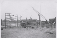 The rides going up on the Cetlin Wilson Shows Midway....1952.JPG