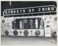 Streets of Cairo Norman Parther calls in the tip for the girl show. The third girl in from the left is.jpg