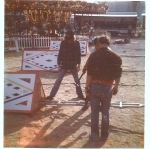 Setting up the dreaded front gate on the Carnival Time Shows 1970's.jpg