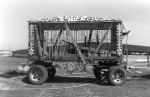 Patched up cage wagon used in the movie Greatest Show on Earth.jpg