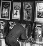 Cub Scout in the penny arcade 1940's (naughty boy..no merit badge for you kid!!).JPG