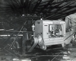 Under the 'Rocket' . Brand new International Harvester power plant 1938.jpg