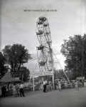1950's Eli Ferris Wheel Next To Snake Show Somewhere around Nashville,Tennessee .