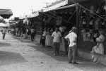 Joint lineup at Delaware St. Fair midway 1957.jpg